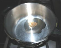  In a pressure cooker add oil, cumin seeds & asafetida & fry